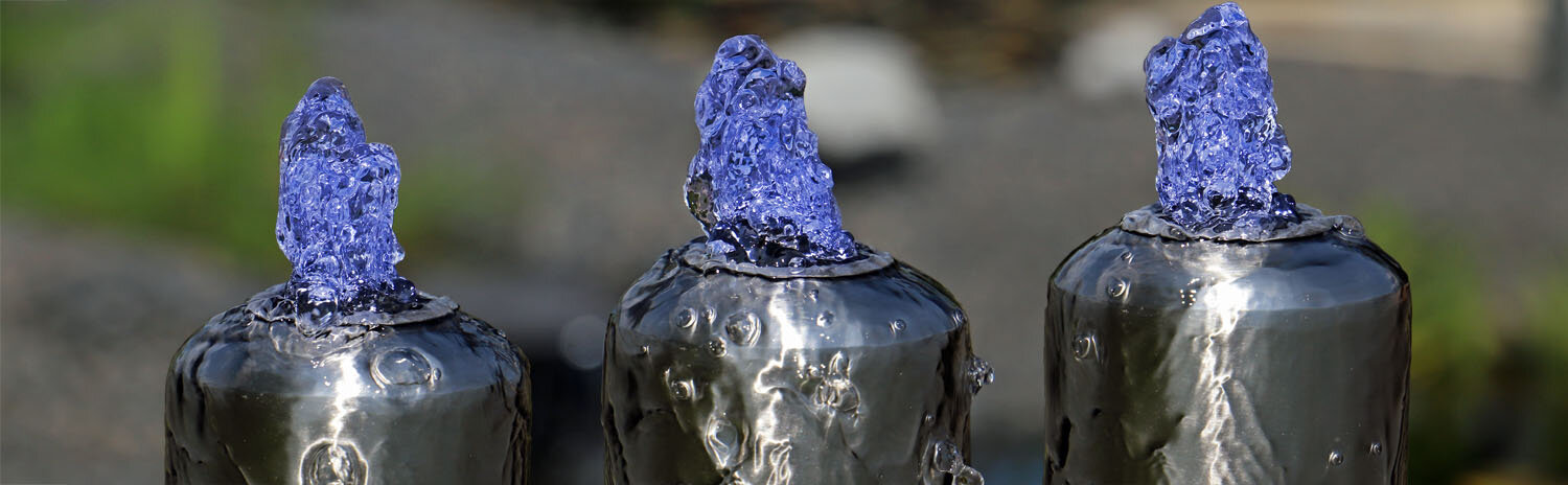 edelstahlspringbrunnen mit blauer LED Beleuchtung