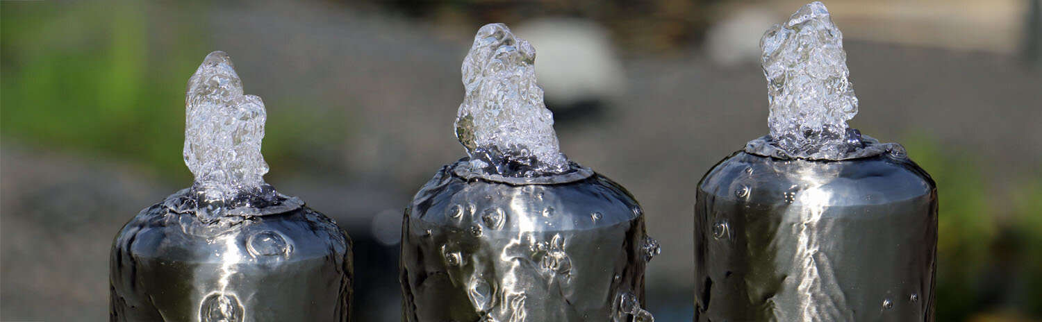 edelstahlspringbrunnen mit neutral weisser LED Beleuchtung